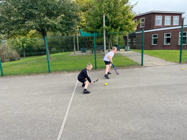 3WB are learning hockey skills!